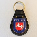 Schlüsselanhänger Polizei Niedersachsen Ärmelabz. auf Lederrücken mit Schlüsselring